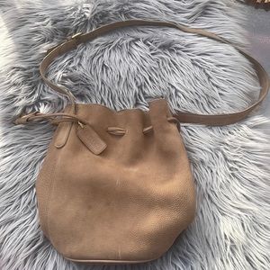 Tan coach bucket bag with attached wallet